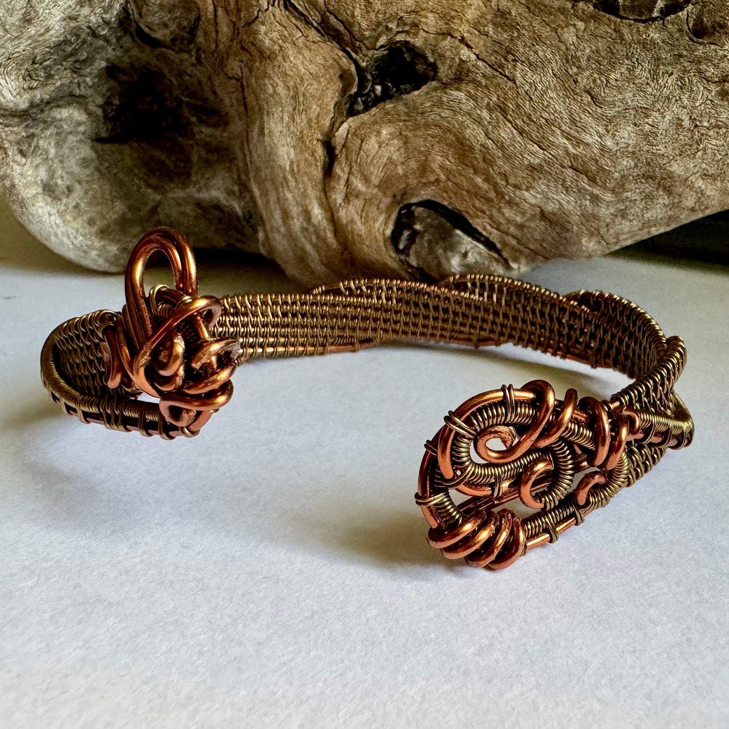 Copper and Antique Bronze Twisting Cuff with wire wrapping technique made by R.Kaelber Artworks.