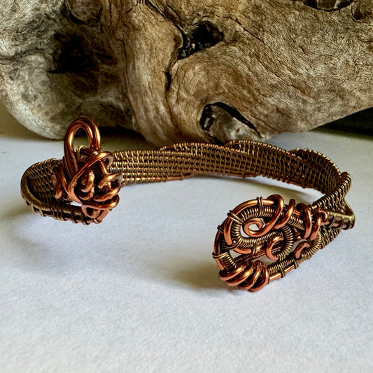 Copper and Antique Bronze Twisting Cuff with wire wrapping technique made by R.Kaelber Artworks.