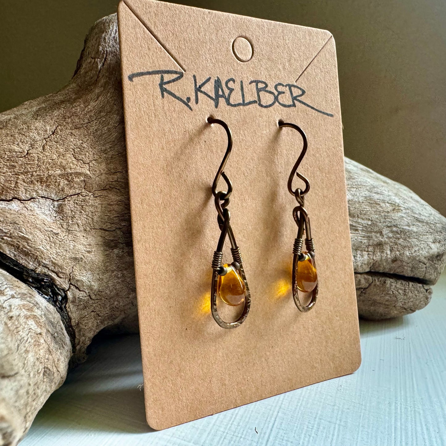 Amber colored Glass Teardrop Earrings with hammered antique bronze