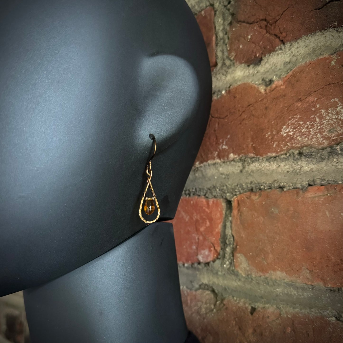 Amber colored Glass Teardrop Earrings with hammered antique bronze